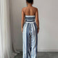 🌀 LIMITED-TIME 50% OFF! 💥 Geometric Jumpsuit with Halter Neckline & Side Slit – Unique Print, Elegant Fit, Versatile Style ✨