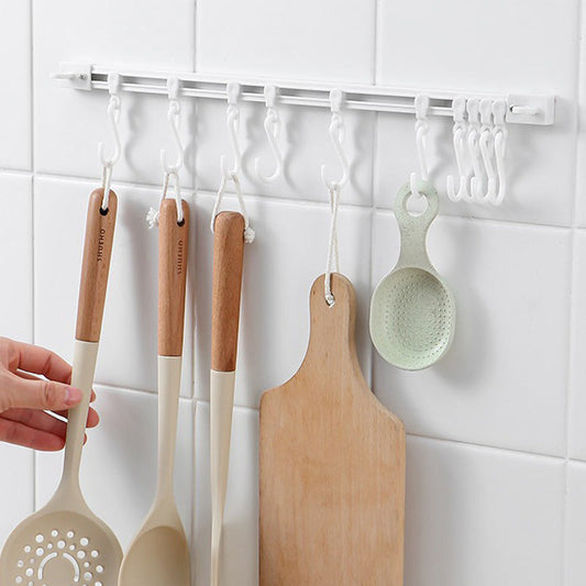 🔥Hot Sale 50% OFF🔥 That Dead Space Behind Your Cabinet Door? No-Drill Slidable Track Hooks – 40cm Track + 10 Sliding Hooks, Peel-Stick in 10 Sec, Holds 35 lbs 🍳